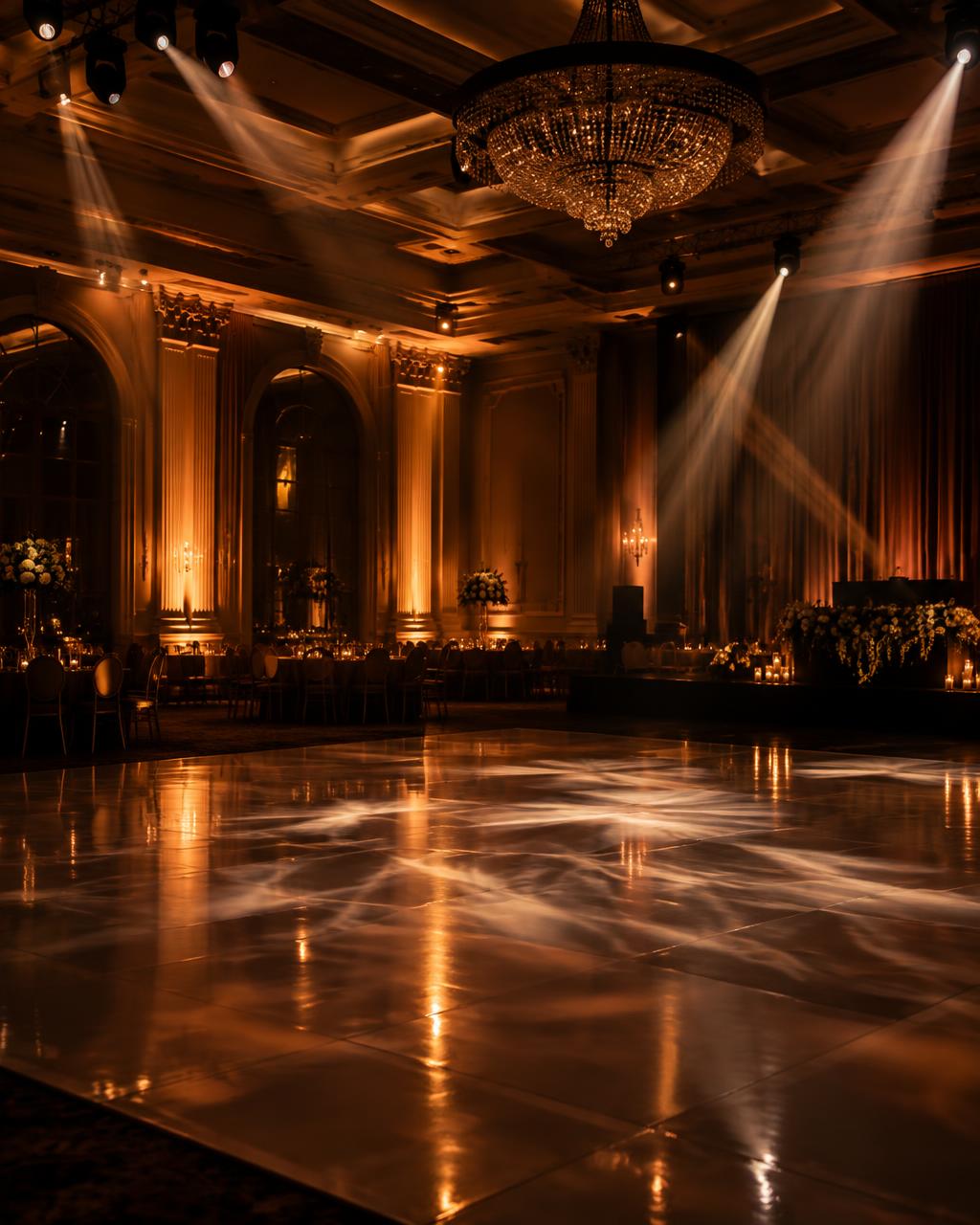 Wedding dance floor with warm event lighting